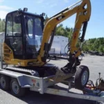 Caterpillar 301.7CR Mini-pelle Hydraulique 1.8T avec Remorque et 3 Godets d'Occasion 2021