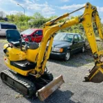 Komatsu PC 09-1 Micro-pelle 0,8 Tonne d'occasion 2008 - 1500 heures - 3 godets inclus